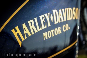 Tank with Harley logo and blue metallic paint